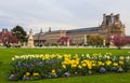 Paris / France - April 05 2019. Marvelous spring Tuileries garden and view at the Louvre Palace