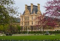 Paris / France - April 05 2019. Marvelous spring Tuileries garden and view at the Louvre Palace