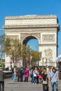 PARIS, FRANCE - APRIL 7, 2011: People walking in front of Arc de Royalty Free Stock Photo