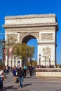 PARIS, FRANCE - APRIL 7, 2011: People walking in front of Arc de Royalty Free Stock Photo