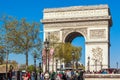 PARIS, FRANCE - APRIL 7, 2011: People walking in front of Arc de Royalty Free Stock Photo