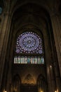 Paris, France - April 1, 2019: Rose stained glass window of Notre Dame Cathedral