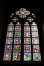 Paris, France - April 1, 2019: Stained glass window inside the Notre Dame Cathedral, Paris, France Royalty Free Stock Photo