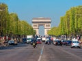 Traffic on champe elysees with arc de triumph on background paris france Royalty Free Stock Photo