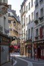 Typical haussmann buildings and restaurant in latin district in Paris Royalty Free Stock Photo