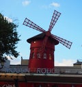 Paris, France - April 2017:View of Moulin Rouge Red Mill at in Paris,famous cabaret in Montmartre neighborhood of French capital