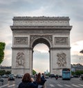 Arch of Triumph Arc de Triomphe in `Les Champs-Ãâ°lysÃÂ©es` of Paris, France visited by a multitude of tourists