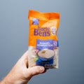 Man hand holding Uncle Ben`s basmati rice