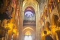 PARIS, FRANCE - August 16, 2018 - interior of the Notre Dame cathedral with suggestive arches and illuminated vaults and gothic Royalty Free Stock Photo