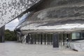 Paris, France - August 24, 2022: Paris Philharmonic. Huge aluminum building and shiny stainless steel facades