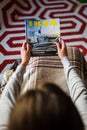 Reading IKEA Catalogue woman read from above Royalty Free Stock Photo