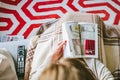 Reading IKEA Catalogue woman read from above Royalty Free Stock Photo