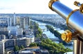 Parisian cityscape from the Eiffel Tower viewpoint with spyglass. Paris, France.