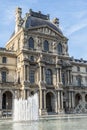 the beautiful facade of the Louvre Museum in Paris Royalty Free Stock Photo