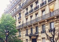 Parisian architecture and historical buildings, restaurants and boutique stores on streets of Paris, France Royalty Free Stock Photo