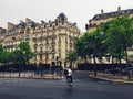 Parisian architecture and historical buildings, restaurants and boutique stores on streets of Paris, France Royalty Free Stock Photo