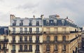 Parisian architecture and historical buildings, restaurants and boutique stores on streets of Paris, France