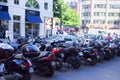 PARIS, FRANCE - CIRCA JUNE 2014: Mopeds parked in street