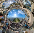 Little planet 360 degree sphere. Panoramic view of tourists visiting the Eiffel tower. Camps Royalty Free Stock Photo