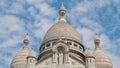 Paris, France - close-up of cupolas and central dome of Sacre-Coeur minor basilica. Sacred Heart church up Montmartre hill. Royalty Free Stock Photo