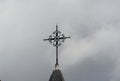 Paris, France, Date 8.13.2018, Time 11 o `clock and 31 minutes,church, Notre-Dame de la Nativite de Bercy forged cross on the roof