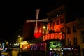 PARIS, FRANCE - Dec 01, 2020: A mesmerising Night shot of the moulin rouge in Paris, France Royalty Free Stock Photo