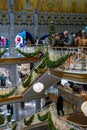 Paris, France - DEC 04, 2021: A people are shopping in the luxury mall La Samaritaine department store.