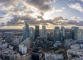 Paris, France - December 09, 2019: Aerial panoramic drone shot of La Defense skycraper in Paris with clouds and sunset Royalty Free Stock Photo