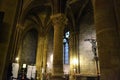 Side aisle of the Notre-Dame cathedral in Paris, France.