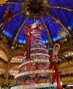 Christmas tree in Galeries Lafayette in Paris on Boulevard Haussmann. Galeries Lafayette is one of most popular, chic Royalty Free Stock Photo