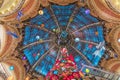 The Christmas tree under the dome of the Galeries Lafayette. The Galeries Lafayette has been selling luxury goods since 1895 Royalty Free Stock Photo