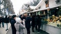 PARIS, FRANCE - DECEMBER, 31, 2016. Crowded Christmas and New Year market. Souvenir, food stalls