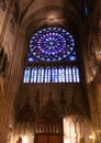 PARIS, FRANCE - DECEMBER 31, 2011:  Notre Dame de Paris cathedral, Interior, panorama of  stained-glass windows, pointed arches, Royalty Free Stock Photo