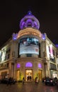 Paris, France - December 1, 2019: Parisiens walk out of printemps shopping mall