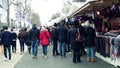 PARIS, FRANCE - DECEMBER, 31, 2016. Steadicam shot of crowded Christmas and New Year market. Souvenir stalls