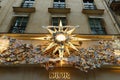 Paris, France - 12 04 2021: View of facade of Christian Dior Paris with christmas decoration