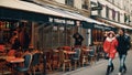 PARIS, FRANCE - DECEMBER, 31, 2016. Walk along beautiful cozy Parisian cafes with awnings Royalty Free Stock Photo