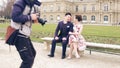 PARIS, FRANCE - DECEMBER, 31, 2016. Young asian couple posing in the Parisian park. Professional wedding photo shooting