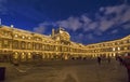 The Louvre Museum inner courtyard illuminated at night