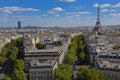 PARIS, FRANCE, EUROPE -Aerial view of Paris, France and Eiffel Tower as seen from the Arch of Triumph on a sunny day with white pu Royalty Free Stock Photo