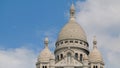 Paris, France - exterior of Sacre-Coeur minor basilica. Sacred Heart church up Montmartre hill. Panorama of city landmark. Royalty Free Stock Photo