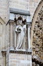 Paris, France - famous Notre Dame cathedral facade saint statues. UNESCO World Heritage Site