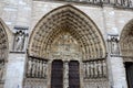 Paris, France - famous Notre Dame cathedral facade saint statues. UNESCO World Heritage Site