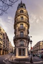Typical Haussmann buildings and street near stock exchange market monument in paris Royalty Free Stock Photo