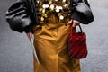Paris, France - February, 29, 2024: woman wears Rabanne bag, fashion blogger outfit details.
