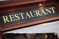 Paris France French restaurant sign lit up at night Royalty Free Stock Photo