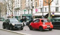 Car accident on PAris street between luxury limousine Lancia Th