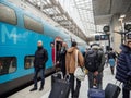 Commuters passengers in Aeroport Charles de Gaulle 2 TGV SNCF train station Royalty Free Stock Photo