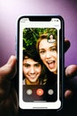 Apple iPhone XS with FaceTime app in App Store Royalty Free Stock Photo