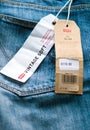 Levi`s jeans denim pants on wooden table Royalty Free Stock Photo